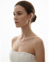 Eda Jewels Dubai collection banner featuring a model wearing the Greta gold plated ear cuff lined with small white pearls, with the text 'EAR CUFFS' overlay at the bottom