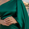 Eda Jewels Dubai gold plated tropical leaf statement ring worn by a model