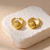 Mira gold plated chunky hoop earrings featuring a central smooth metal sphere charm by Eda Jewels Dubai