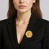 Alexandra gold plated textured brooch, a sculptural statement accessory perfect for styling with blazers by Eda Jewels Dubai