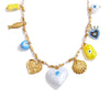Amora statement necklace featuring an eclectic mix of gold plated charms, hearts, and evil eye motifs, perfect for everyday wear by Eda Jewels Dubai perfect for gifting