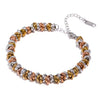 Athena tricolor gold plated silver rose twisted link stacking bracelet by Eda Jewels Dubai. Perfect for stacking with watch.