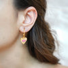 Aya gold plated pink evil eye heart hoop earrings by Eda Jewels Dubai. Perfect daily wear gifting piece.