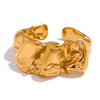 Ayla gold plated everyday statement ring featuring an organic, molten, crumpled texture by Eda Jewels Dubai