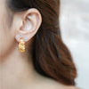 Ayla gold plated crumpled molten huggie hoop earrings by Eda Jewels Dubai. Perfect daily wear gifting piece.
