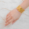 Gaia gold plated wavy molten chunky cuff bracelet. Perfect statement gifting daily wear piece by Eda Jewels Dubai.