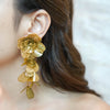 Large gold plated cascading floral statement dangle earrings with textured petals, by eda jewels dubai