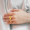 Isabella everyday gold plated molten drop ring worn by a model by Eda Jewels Dubai