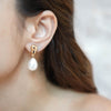 Mani gold plated molten stud pearl drop earrings by Eda Jewels Dubai. Perfect statement daily wear gifting piece.