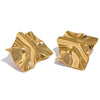 Gold plated Mila earrings by Eda Jewels Dubai, featuring a modern wavy, abstract design. Perfect for everyday wear or gifting