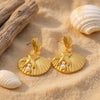 Moana gold plated seashell drop earrings with a textured starfish and pearl accents by Eda Jewels Dubai