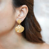 Moana gold plated seashell and starfish earrings by Eda Jewels Dubai. Perfect for daily wear and gifting.