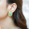 Gold-plated Noor stud earrings featuring a vibrant turquoise stone, by Eda Jewels Dubai. Perfect for daily wear and giftin