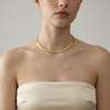 gold-plated Orra choker necklace by Eda Jewels, featuring a sleek, minimalist design. Perfect for everyday wear or gifting