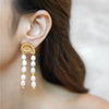 Shelly gold plated seashell pearl drop earrings by Eda Jewels Dubai. Perfect statement daily or party wear gifting piece.
