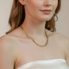 Sona gold plated multi strand layered necklace with fine fluid chains worn by a model by Eda Jewels Dubai