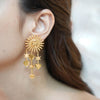 Gold-plated Sora sun, star, and heart statement earrings by Eda Jewels Dubai. Perfect for daily wear and gifting