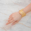 Terra gold plated crumpled molten chunky cuff bracelet. Perfect statement daily wear or gifting piece by Eda Jewels Dubai.